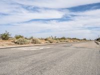 Asphalt Road Under Clear Skies in California