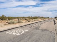 Asphalt Road Under Clear Skies in California