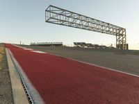 Asphalt Road Under a Clear Sky: A Structured Path