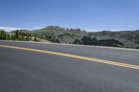 Asphalt Road in Colorado: Driving through the Highland Mountains