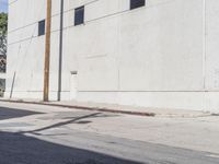 Asphalt Road and Concrete Building: A Photographic View