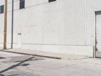 Asphalt Road and Concrete Building: A Photographic View