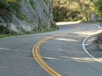 Asphalt Road Curving Rock Wall 001