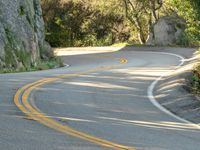 Asphalt Road Curving Rock Wall 003