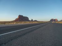 Asphalt Road at Dawn in Monument Valley, Arizona