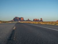 Asphalt Road at Dawn in Monument Valley, USA