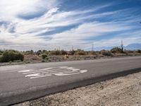 Asphalt Road in Los Angeles: A Desert Landscape Under Clear Skies