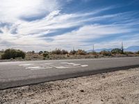 Asphalt Road in Los Angeles: A Desert Landscape Under Clear Skies