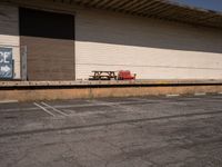 Asphalt Road Leading to a Los Angeles Warehouse