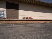 Asphalt Road Leading to a Los Angeles Warehouse