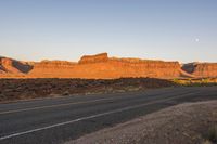 Asphalt Road in Low Desert with Horizon