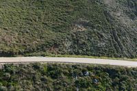 Asphalt Road through Mountain Pass: Aerial View