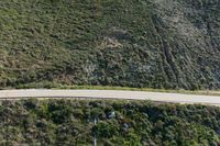 Asphalt Road through Mountain Pass: Aerial View