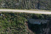 Asphalt Road through Mountain Pass: Aerial View