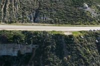 Asphalt Road through Mountain Pass: Aerial View