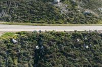 Asphalt Road through Mountain Pass: Aerial View