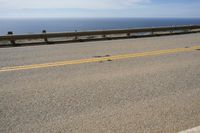 Asphalt Road with Ocean Views and Sandy Beaches