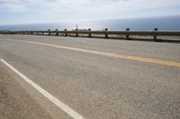 Asphalt Road with Ocean Views and Sandy Beaches