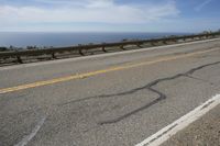 Asphalt Road with Ocean Views and Sandy Beaches