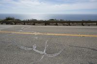 Asphalt Road with Ocean Views and Sandy Beaches