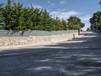 Asphalt Road in Residential Area Spain: Clear Sky