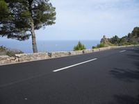 Asphalt Road in the Spanish Landscape: Under a Clear Sky