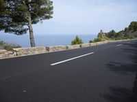 Asphalt Road in the Spanish Landscape: Under a Clear Sky
