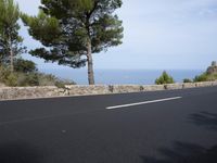 Asphalt Road in the Spanish Landscape: Under a Clear Sky