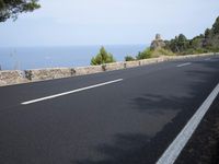 Asphalt Road in the Spanish Landscape: Under a Clear Sky