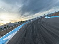 Asphalt Road with Sunrise Visible