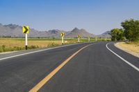 Asphalt Road in Thailand under Clear Sky