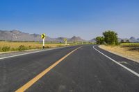 Asphalt Road in Thailand under Clear Sky