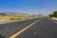 Asphalt Road in Thailand under Clear Sky