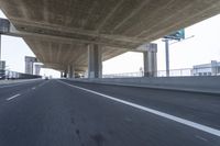 Underpass on a Grey Day: Asphalt Road