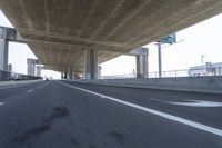 Underpass on a Grey Day: Asphalt Road