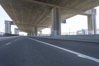 Underpass on a Grey Day: Asphalt Road