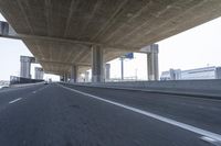 Underpass on a Grey Day: Asphalt Road
