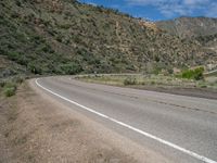 Asphalt Road in Utah's Mountainous Landscape