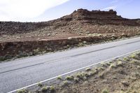 Asphalt Road in Utah Highland: Exploring the Desert Landscape