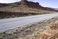 Asphalt Road in Utah Highland: Exploring the Desert Landscape