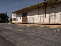 Asphalt Road Leading to Warehouse in Los Angeles