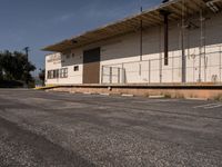 Asphalt Road Leading to Warehouse in Los Angeles