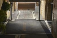 an overhead view of the entrance to the building that holds the train on the tracks