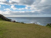 Australian Coastal Landscape: Water and Grassy Bank