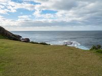 Australian Coastal Landscape: Water and Grassy Bank