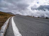 Austria Landscape: Mountain Road with Dramatic Clouds