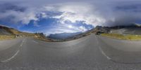 a 3d generated image of a road going by a mountain range with cars driving down it