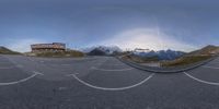 the panoramic view of a road near some mountains is a nice idea to capture a different angle