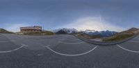 the panoramic view of a road near some mountains is a nice idea to capture a different angle