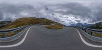 a road curves along a winding hill side under clouds and dark skies in a 3d picture